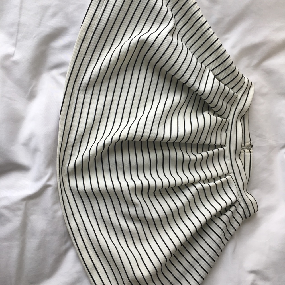 Worn black and white striped skirt